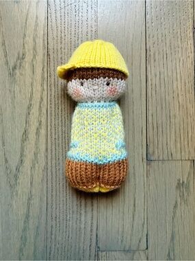 Hand-knitted small doll